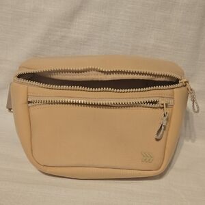 All in Motion Tan Crossbody Bag